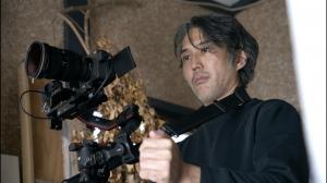 撮影をする遠藤さんの写真です。